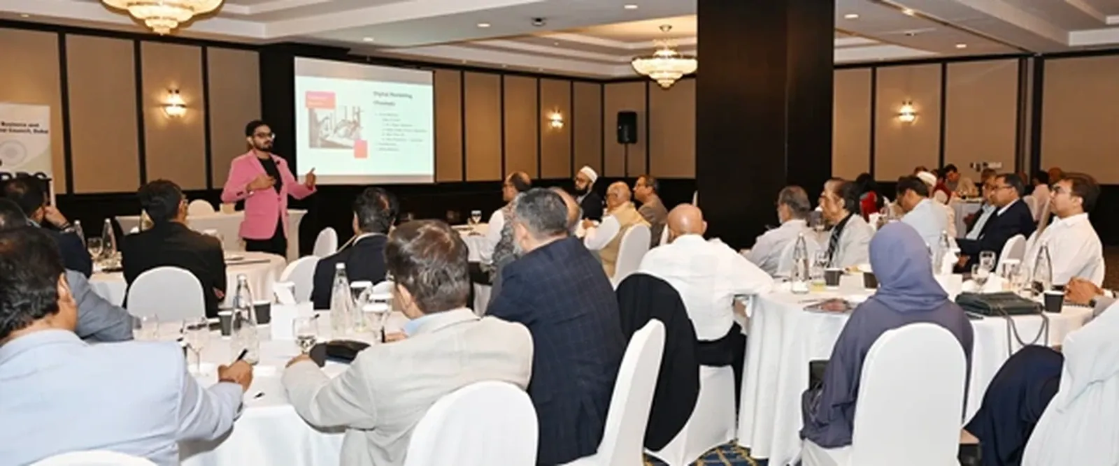 Training session in progress with full audience